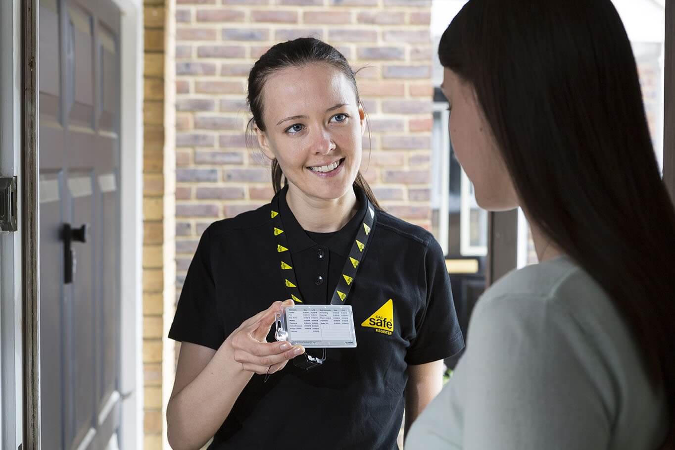 Engineer showing Gas Safe ID card
